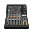 Yamaha DM3 digital mixing console with a display screen, multiple control knobs, and buttons on the front panel.